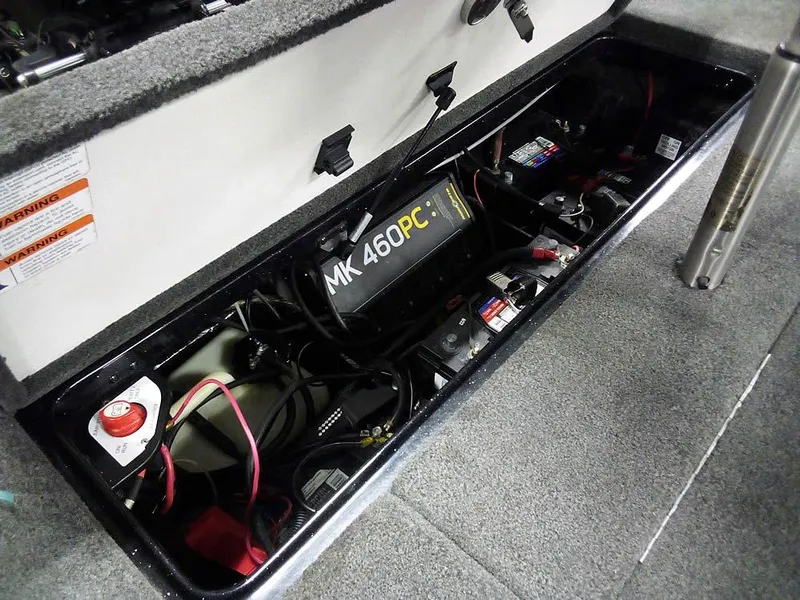 Slide: The Image of 2013 Ranger Z520C Comanche battery compartment with MK 460PC charger and wiring. - 43