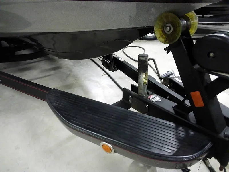 Slide: The Image of 2013 Ranger Z520C Comanche boat trailer with step and roller detail. - 47