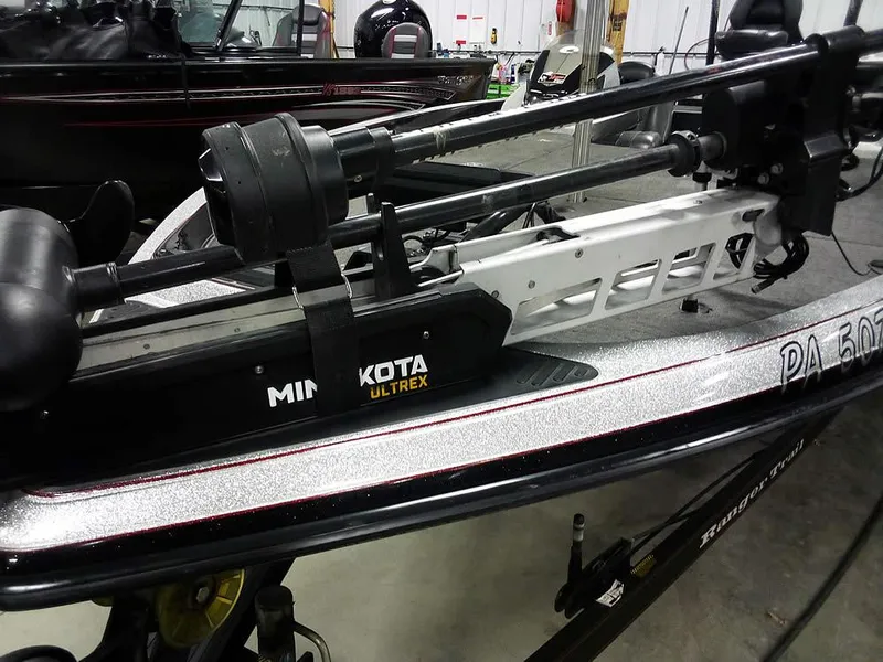 Slide: The Image of 2013 Ranger Z520C Comanche with Minn Kota Ultrex trolling motor in a showroom. - 5
