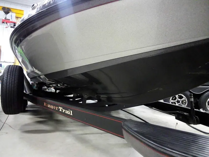 Slide: The Image of 2013 Ranger Z520C Comanche boat on Ranger Trail trailer in garage. - 6