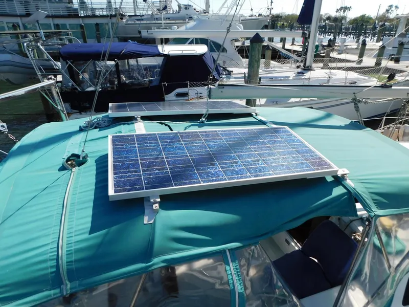 Slide: The Image of Solar panel on 1998 Catalina 34 Mark II sailboat, docked in marina. - 4