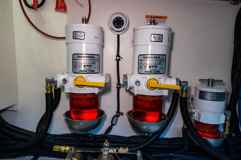 Slide: The Image of Engine room of 2025 Riviera 4600 Sport Yacht with Racor fuel filters. - 56