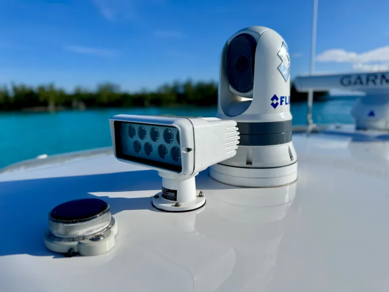 Slide: The Image of 2023 Intrepid 427 Nomad SE boat with advanced navigation equipment on deck. - 12