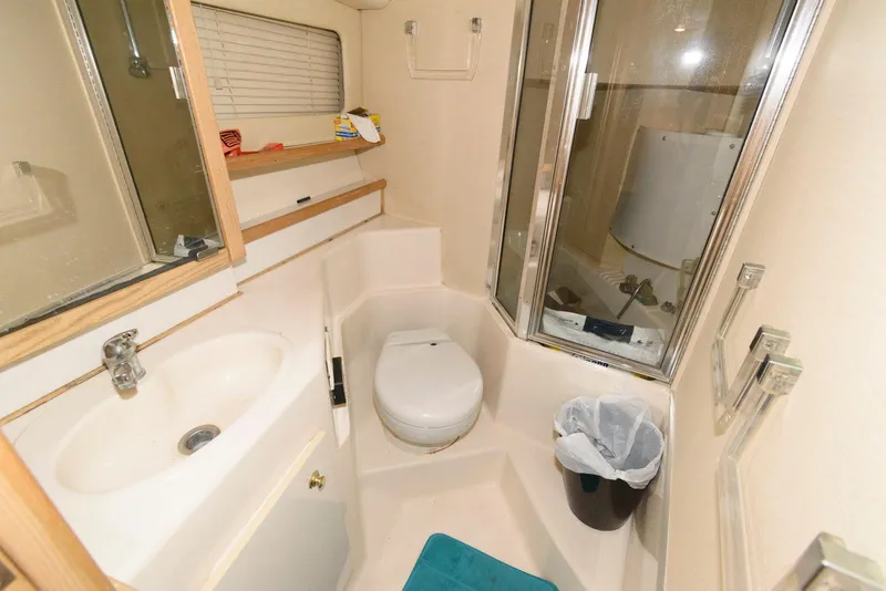 Slide: The Image of Bathroom interior of 1998 Bayliner 4788 Pilot House Motoryacht with shower and sink. - 17