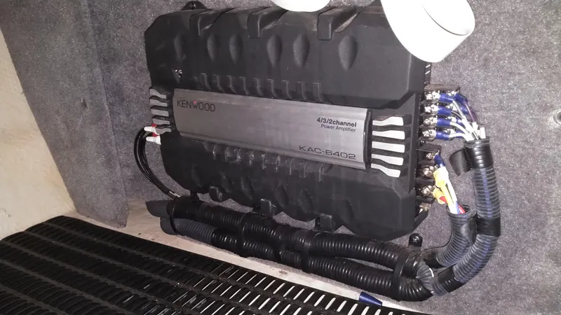 Slide: The Image of Kenwood amplifier installed in a 2008 Monterey 254 FS boat. - 12