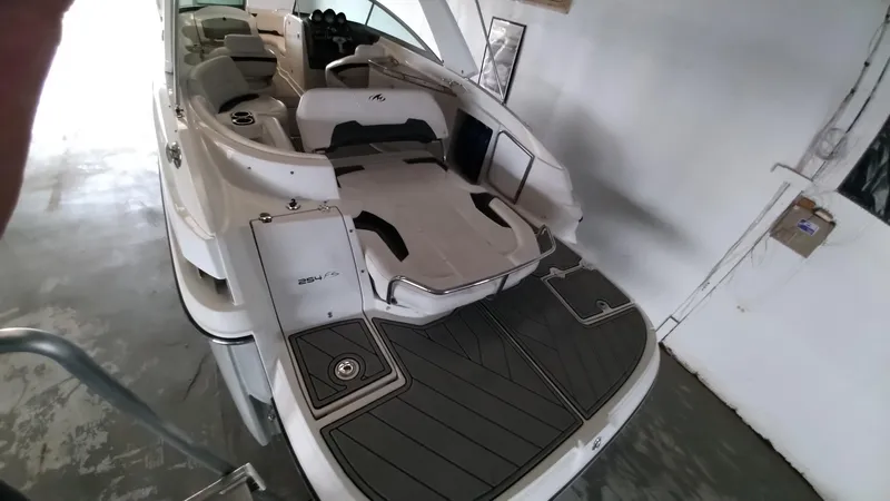 Slide: The Image of 2008 Monterey 254 FS boat interior with seating and swim platform. - 19