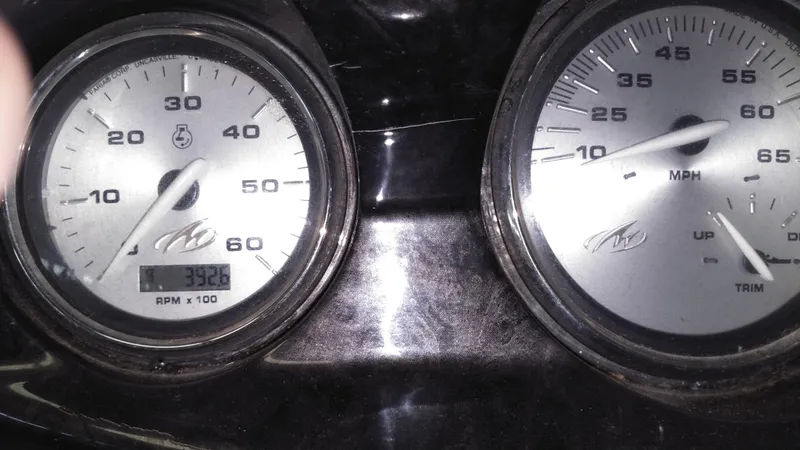 Slide: The Image of Close-up of 2008 Monterey 254 FS boat gauges displaying RPM and speed in MPH. - 20