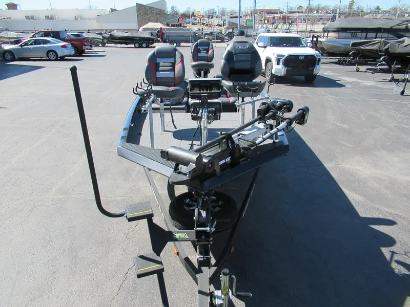 Slide: The Image of 2019 Ranger RT188C fishing boat with seating and motor, parked in a lot. - 4
