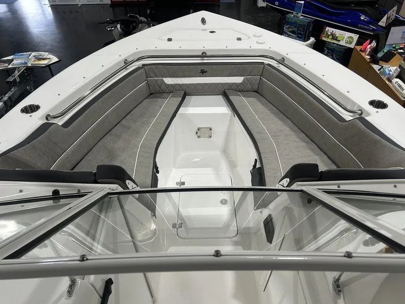 Slide: The Image of 2025 Sea Pro 240 Dual Console boat interior with spacious seating and sleek design. - 6