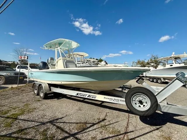 The Image of 2025 Avenger AV26 boat on trailer under clear blue sky. - 0