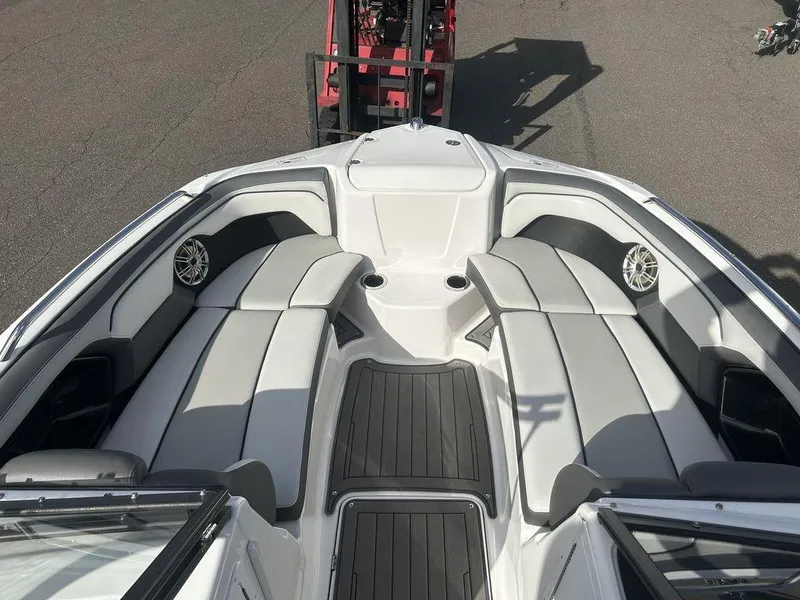 Slide: The Image of 2017 Yamaha Boats 212 Limited S interior with spacious seating and sleek design. - 5