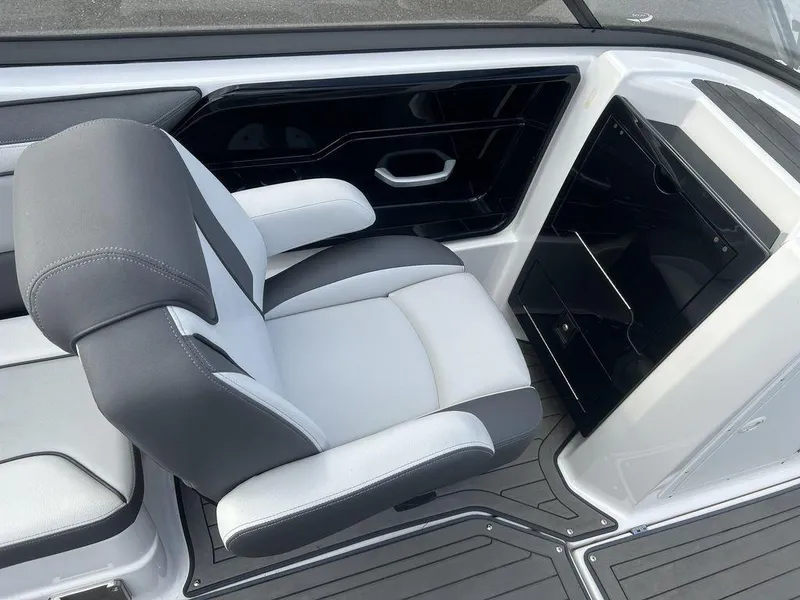 Slide: The Image of 2017 Yamaha Boats 212 Limited S interior with gray and white seating. - 7