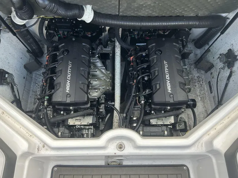 Slide: The Image of 2017 Yamaha Boats 212 Limited S engine compartment with dual high output engines. - 9