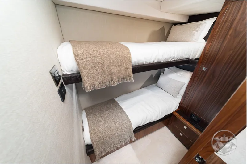 Slide: The Image of Luxurious bunk beds in 2025 Riviera 64 Sports Motor Yacht cabin. - 51