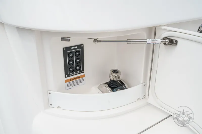Slide: The Image of Control panel and equipment compartment on 2025 Riviera 64 Sports Motor Yacht. - 60