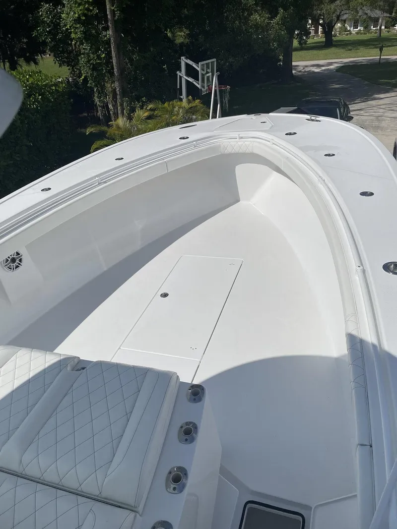 Slide: The Image of 2021 Onslow Bay 41 Tournament Edition boat interior with luxurious seating and ocean view. - 12