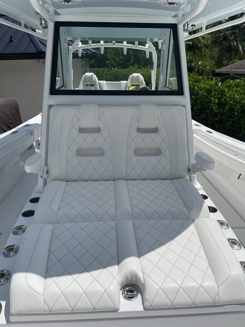 Slide: The Image of 2021 Onslow Bay 41 Tournament Edition boat on open water, showcasing sleek design. - 14