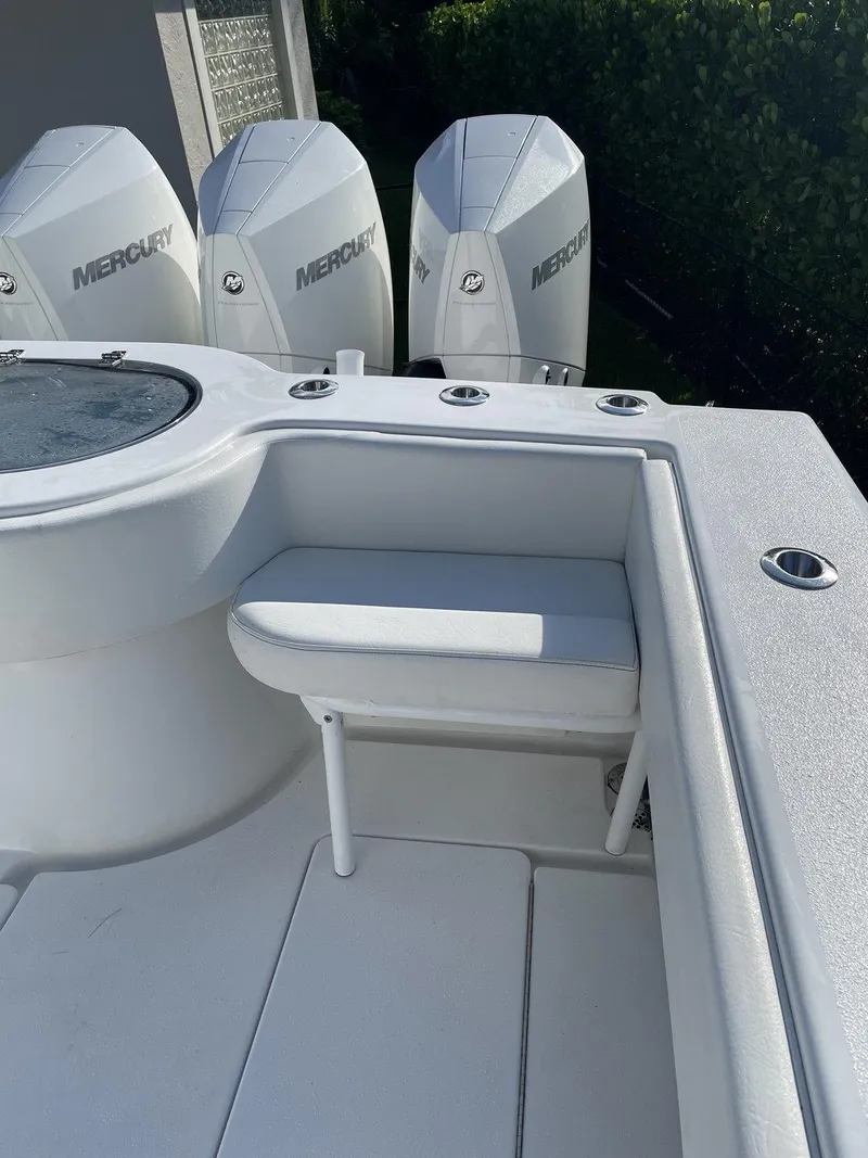 Slide: The Image of 2021 Onslow Bay 41 Tournament Edition boat on trailer, parked outdoors. - 19