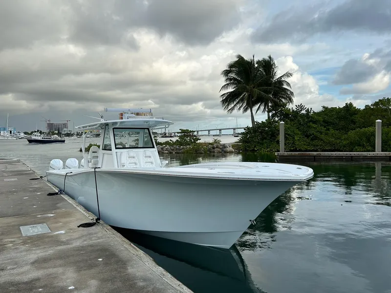 Slide: The Image of 2021 Onslow Bay 41 Tournament Edition boat cruising on open water. - 2