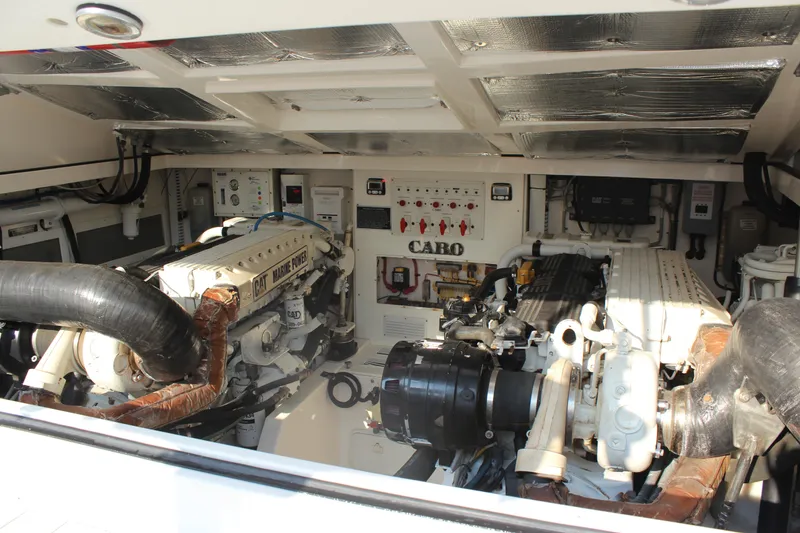 Slide: The Image of Engine room of 2005 Cabo 40 Hardtop Express with CAT marine engines. - 33