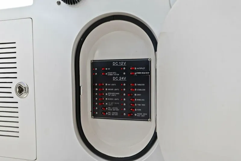 Slide: The Image of Electrical panel with DC 12V and 24V indicators in a 2008 Altima Sedan. - 15