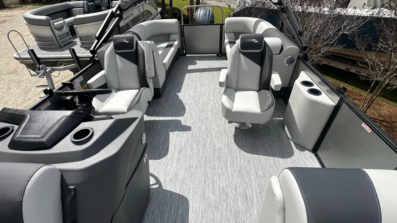 Slide: The Image of 2025 Bennington S Quad Bench 22 SSR interior with modern seating and sleek design. - 4