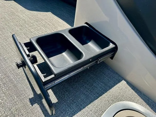 Slide: The Image of 2023 Barletta C20UC boat with dual cup holder on textured flooring. - 14