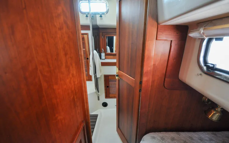 Slide: The Image of Tartan 4100 - Diamond - Aft Cabin - Door to Head - 112