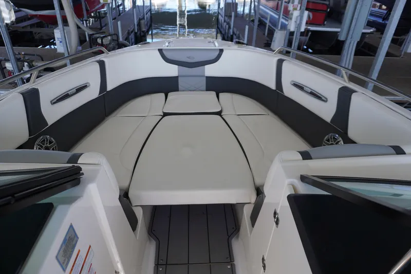 Slide: The Image of 2022 Chaparral 287 SSX boat interior with spacious seating and modern design. - 13
