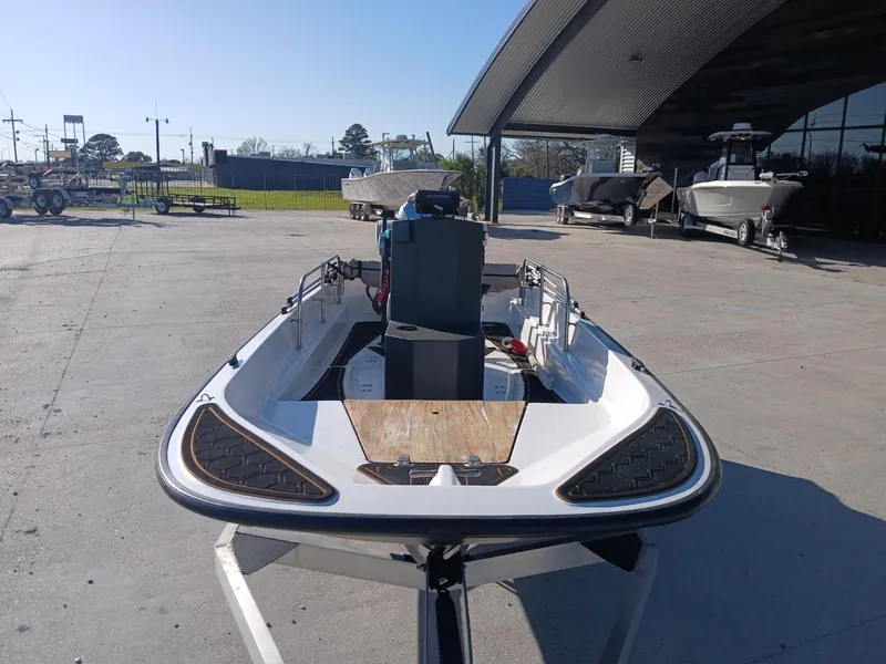Slide: The Image of 1980 Boston Whaler 15 Montauk boat interior with steering wheel and control panel. - 6