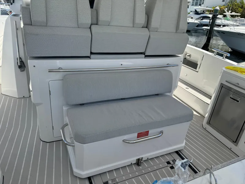 Slide: The Image of 2019 Azimut Verve 40 boat seating area with gray cushions and sleek design. - 16