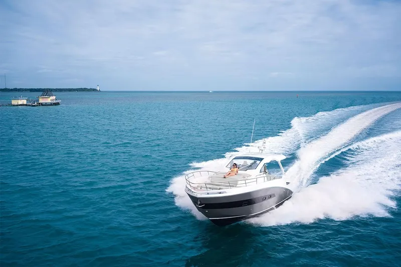 Slide: The Image of 2019 Azimut Verve 40 yacht cruising on open blue water. - 4