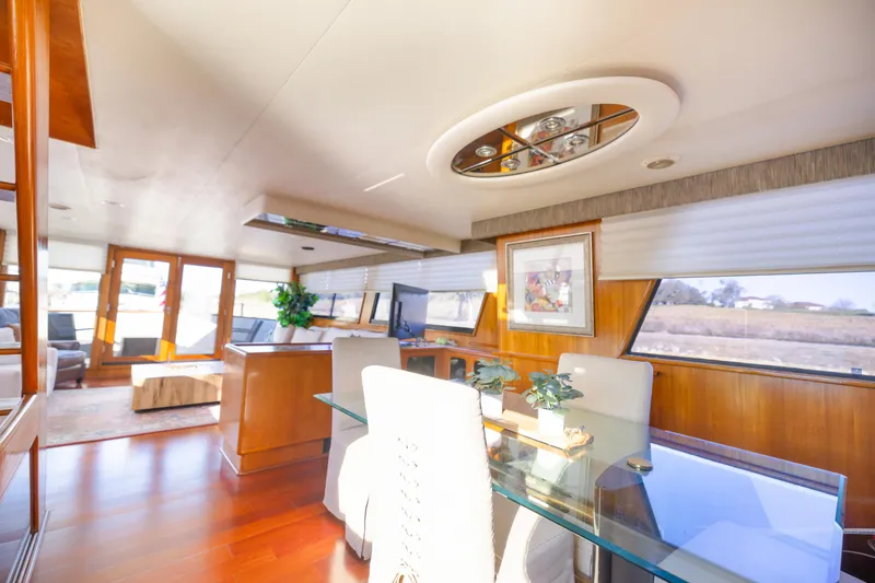 Slide: The Image of Luxurious interior of a 1989 Viking 63 Motor Yacht with elegant furnishings and decor. - 21