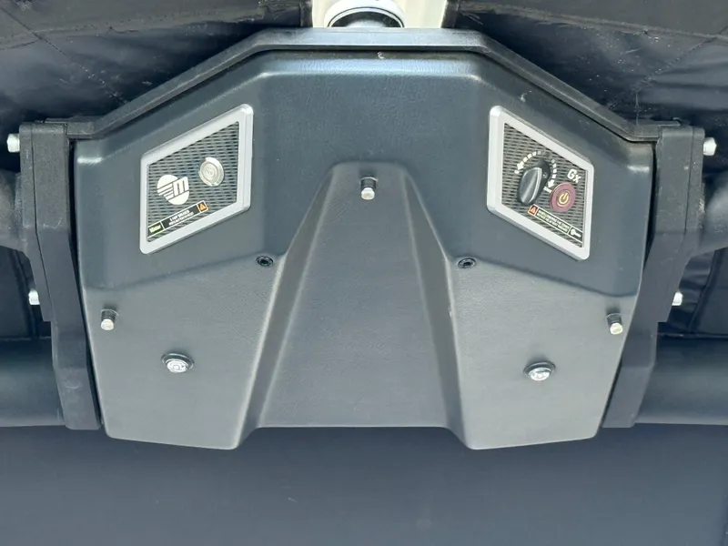 Slide: The Image of 2021 Malibu M240 boat component with control panels and bolts. - 33