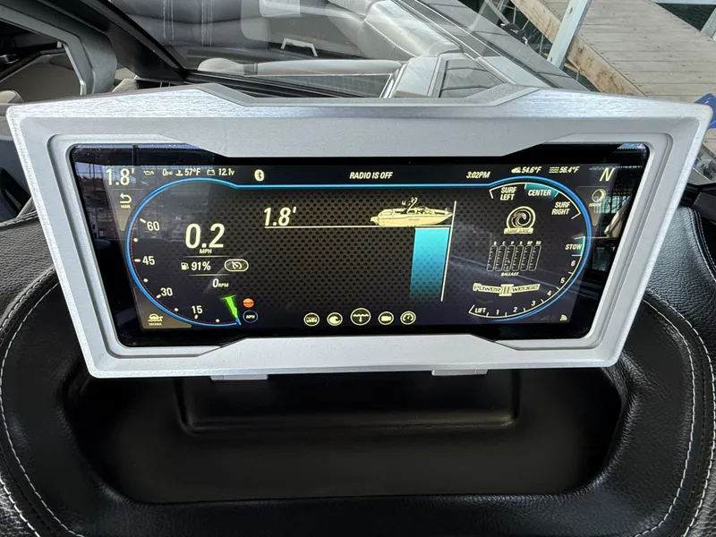 Slide: The Image of Dashboard display of a 2021 Malibu M240 boat showing navigation and performance metrics. - 28