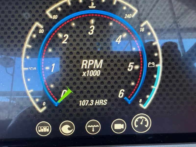 Slide: The Image of 2021 Malibu M240 dashboard displaying RPM gauge and 107.3 engine hours. - 31