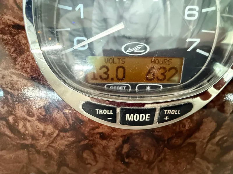 Slide: The Image of Close-up of 2004 Sea Ray 340 Sundancer dashboard display showing 13 volts and 632 hours. - 15