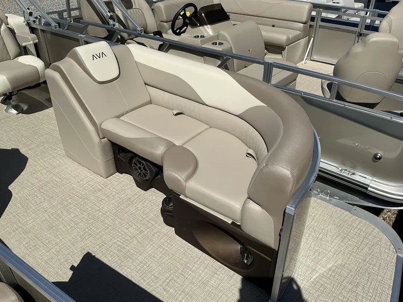 Slide: The Image of 2025 Avalon LSZ - 23 FT Rear Lounger boat interior with beige seating. - 3