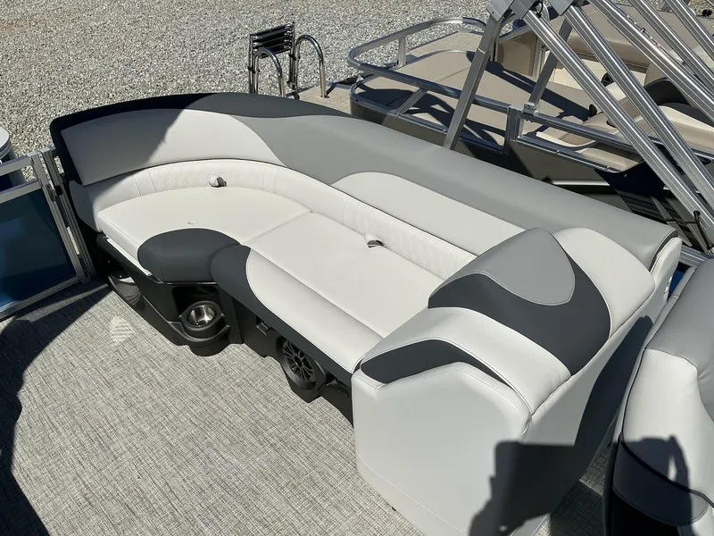 Slide: The Image of 2025 Avalon LSZ - 23 FT boat with sleek white and gray seating. - 8