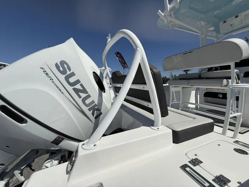 Slide: The Image of 2025 Sea Pro 225FLX SANDBAR boat with Suzuki four-stroke engine, rear seating view. - 6