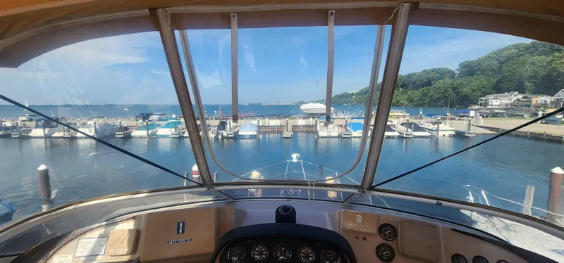 Slide: The Image of View from 2006 Carver 36 Aft Cabin Motor Yacht at marina, overlooking boats and waterfront. - 2