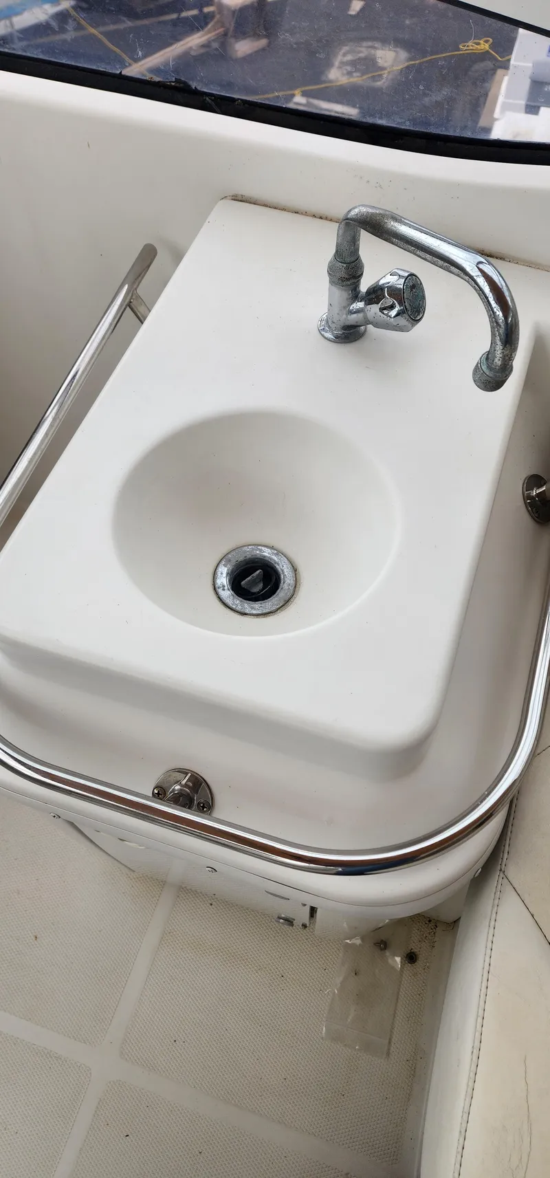 Slide: The Image of 2006 Carver 36 Aft Cabin Motor Yacht sink with chrome faucet. - 22