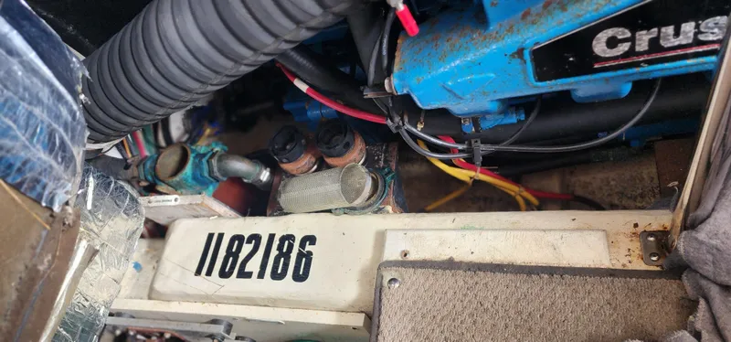 Slide: The Image of Engine compartment of 2006 Carver 36 Aft Cabin Motor Yacht with visible components and wiring. - 33