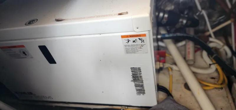 Slide: The Image of Engine compartment of 2006 Carver 36 Aft Cabin Motor Yacht, showing equipment and wiring. - 36