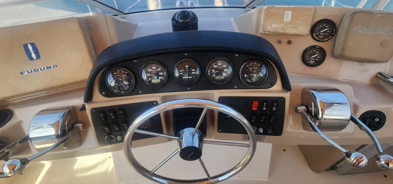Slide: The Image of Helm of 2006 Carver 36 Aft Cabin Motor Yacht with gauges and controls. - 6