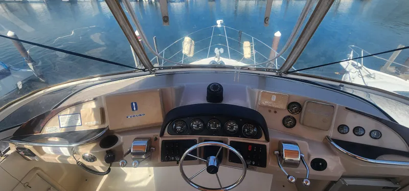 Slide: The Image of Helm of 2006 Carver 36 Aft Cabin Motor Yacht with navigational instruments. - 38