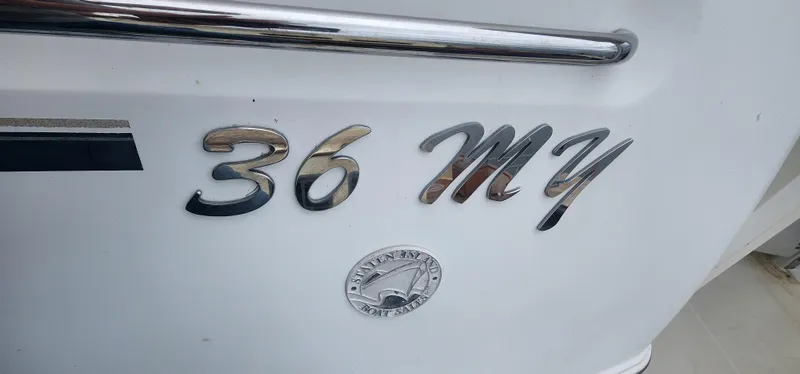 Slide: The Image of Carver 36 Aft Cabin Motor Yacht 2006, chrome lettering on white hull. - 4