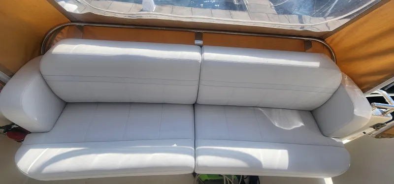 Slide: The Image of White leather seating on 2006 Carver 36 Aft Cabin Motor Yacht. - 40