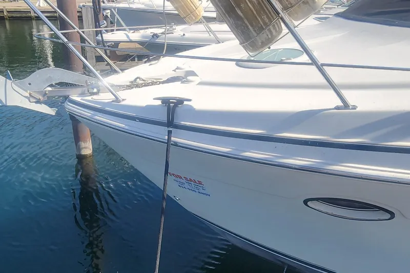 Slide: The Image of 2006 Carver 36 Aft Cabin Motor Yacht docked, for sale sign visible. - 45