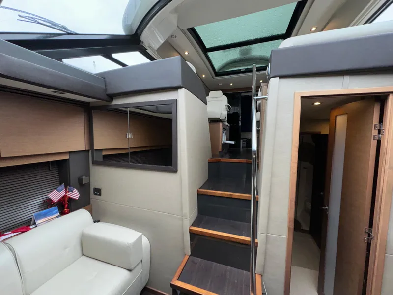 Slide: The Image of Interior of 2016 Sea Ray 470 Sundancer yacht with modern design and skylight. - 15